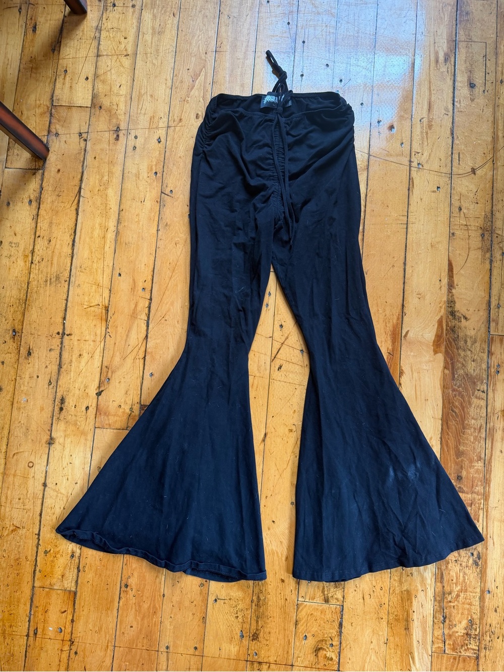 Dollskill Darker Wavs black reverb v-cut bell bottoms flare pants